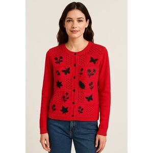 Teddi size XL beaded crocheted button front cardigan.